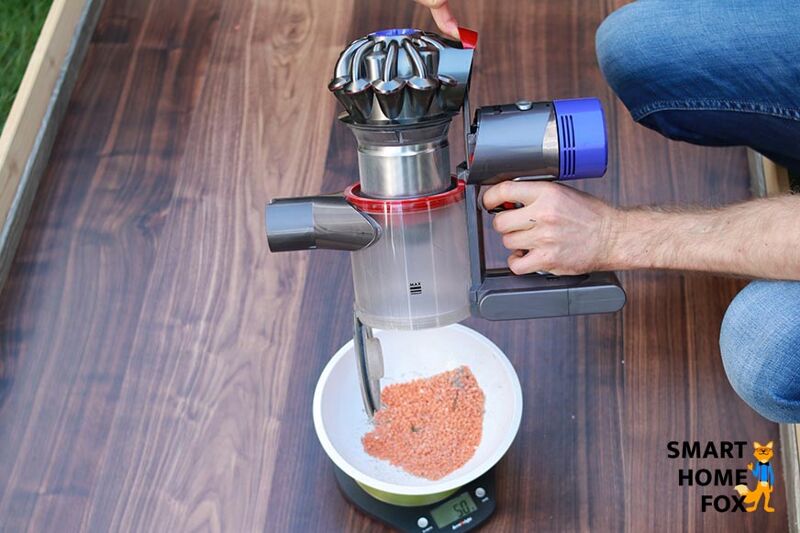 Comparing the emptying mechanism of the Dyson V8 vs V10 Absolute